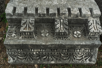 Ancient art. Details of beautiful decor of real very old monument of history. Horizontal color photography.