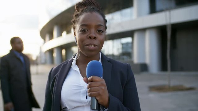 Lockdown of female African news reporter making reportage from the scene