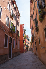 Fototapeta na wymiar Typical street in Venice, Italy.