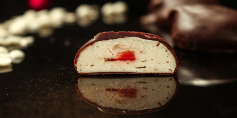 candies, chocolate, soufflé, coffee (Black background). copy space