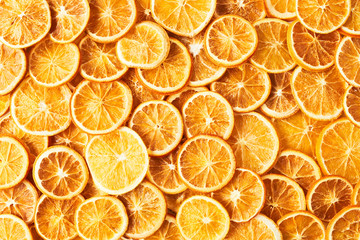 Natural dried oranges or dried grapefruit background. Sliced and dried candied citrus fruit...