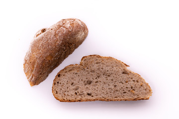 Organic farmer's bread slices, isolated on white background