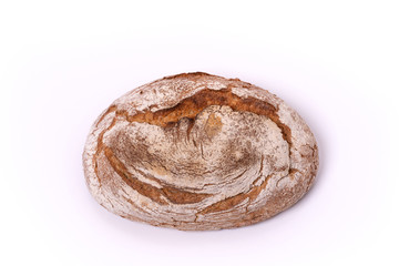 Loaf of organic farmer's bread, isolated on white background