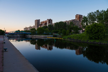 Fototapeta na wymiar Lachine Canal industry reflection, Montreal at dusk