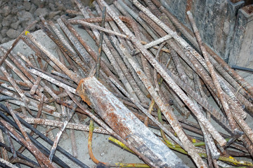 Pile of Scrap Iron Bars in a Construction Site.