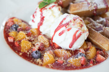 closeup berry jam with butter waffle