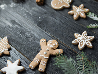 Christmas gingerbread cookies on wooden table with copy space