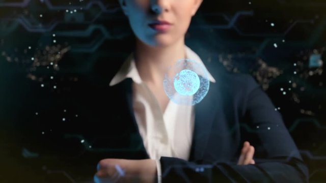 Futuristic business woman, uses a hologram of the world ball. Logo Mockup. Concept: future, fast Internet, network, communication, social media.