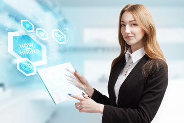 The concept of business, technology, the Internet and the network. A young entrepreneur working on a virtual screen of the future and sees the inscription: now hiring