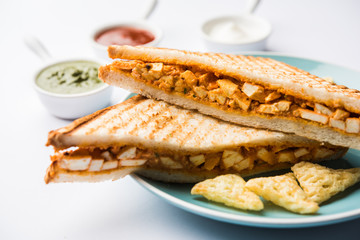 Paneer tikka Sandwich - is a popular Indian version of sandwich using cottage cheese curry with tomato ketchup, mint chutney