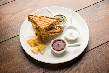 Paneer tikka Sandwich - is a popular Indian version of sandwich using cottage cheese curry with tomato ketchup, mint chutney