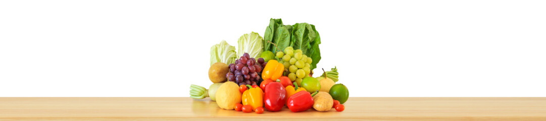 Fresh fruits and vegetables grocery product on wood table isolated on white background