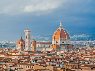 Fototapeta na wymiar Cathedral of Santa Maria del Fiore in Florence . The view from the viewpoint. The old town and the brown-tiled roofs