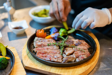 sirloin steak cooking with chef.
