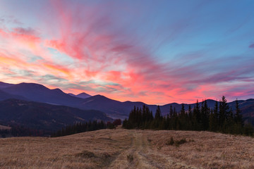 Carpathian mountains with the majestic sunset sky, Ukraine.