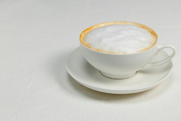 Cup of coffee on white background