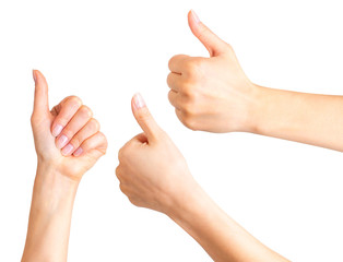 Woman holding hands in gesture of like sign, giving thumb up