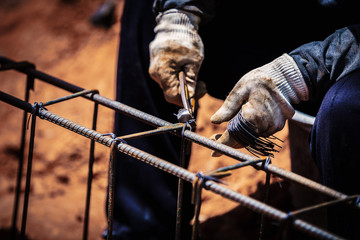 Industry construction site labor people worker wire steel bar