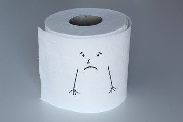 A white toilet paper roll sketched with a sad character with melancholic face and arms down, representing the sadness feeling through his face
