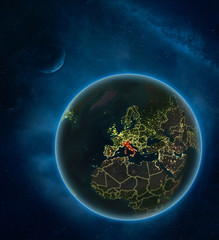 Italy at night from space with Moon and Milky Way. Detailed planet Earth with city lights and visible country borders.
