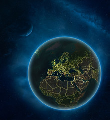 Albania at night from space with Moon and Milky Way. Detailed planet Earth with city lights and visible country borders.