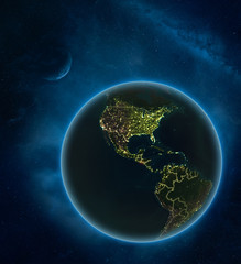El Salvador at night from space with Moon and Milky Way. Detailed planet Earth with city lights and visible country borders.