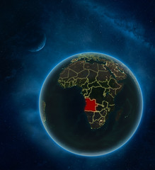 Angola at night from space with Moon and Milky Way. Detailed planet Earth with city lights and visible country borders.