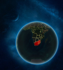 South Africa at night from space with Moon and Milky Way. Detailed planet Earth with city lights and visible country borders.