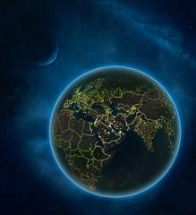 Qatar at night from space with Moon and Milky Way. Detailed planet Earth with city lights and visible country borders.