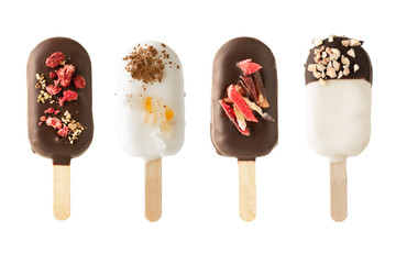Different variants of cake popsice creams on white background