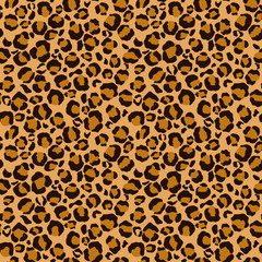 Leopard Print Seamless Pattern - Leopard print design in brown, orange, and gold colors