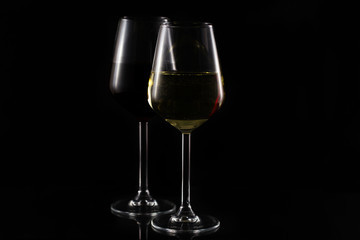 wine glasses on black background. minimalist style
