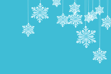 Naklejka na ściany i meble New Year's background. Ice snowflakes hang on threads.
