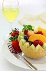 Fancy cut melon with assorted fruit inside
