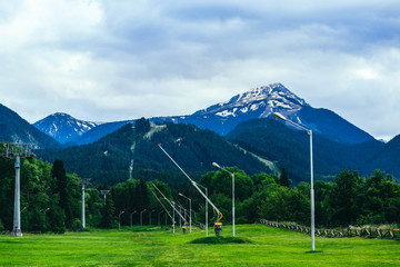 Ski and snowboarding resort in Bulgaria, Bansko. Mountains with snow peak, summer.