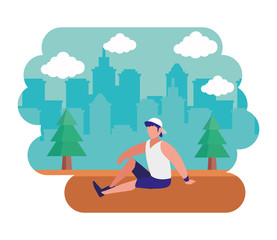 man making yoga in the park city