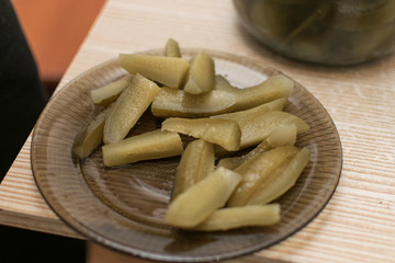 Marinated sliced cucumbers on a plate.