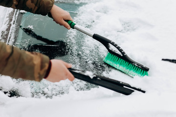 Cleaning car from snow