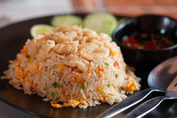 Prawn with fired rice in ceramics plate
