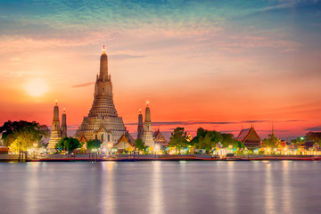 Thai Temple at Chao Phraya River Side, Sunset at Wat Arun Temple in Bangkok Thailand. Wat Arun is a...