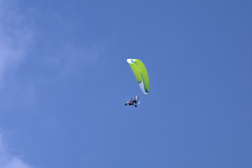 motorized paraglider,fly,sport,freedom,adventure,skydiving,blue,sport,fun,air,extreme