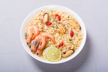 Instant noodles soup with shrimps and mssels . Asian food