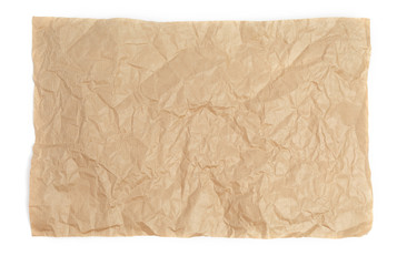 Crumpled sheet of kraft paper on a white background as a template for a backdrop