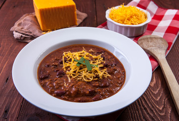 Delicious bowl of chili and cheese.