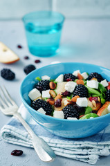 Pear arugula blackberry almond goat cheese dried cranberry salad