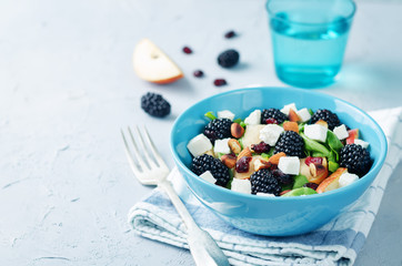 Pear arugula blackberry almond goat cheese dried cranberry salad