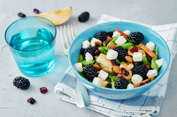 Pear arugula blackberry almond goat cheese dried cranberry salad