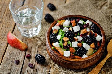Pear arugula blackberry almond goat cheese dried cranberry salad