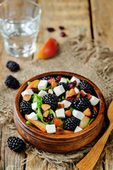 Pear arugula blackberry almond goat cheese dried cranberry salad