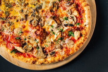 pizza on the black background